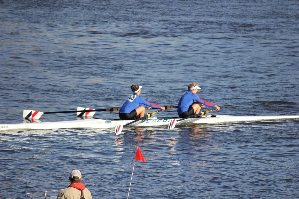 Kelsey Ritchie and Natalie Partlow on their way to a bronze medal in the girls first varsity double. Photo by Rina Eidelberg